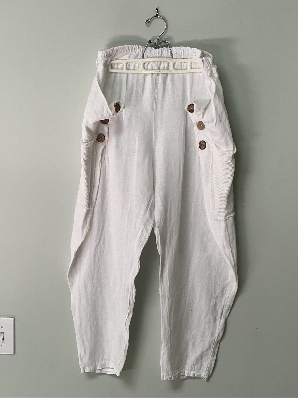 Relaxed White Wide-Leg Linen Pants with Button Detail